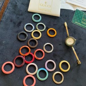 Vintage Gucci bracelet with 22 changeable bezels.